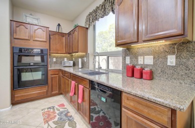 This gorgeous 4 bedroom, 3 bath home with a pool in the growing on The Golf Club At Johnson Ranch in Arizona - for sale on GolfHomes.com, golf home, golf lot