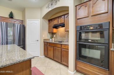 This gorgeous 4 bedroom, 3 bath home with a pool in the growing on The Golf Club At Johnson Ranch in Arizona - for sale on GolfHomes.com, golf home, golf lot
