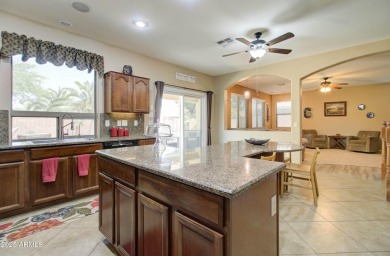 This gorgeous 4 bedroom, 3 bath home with a pool in the growing on The Golf Club At Johnson Ranch in Arizona - for sale on GolfHomes.com, golf home, golf lot