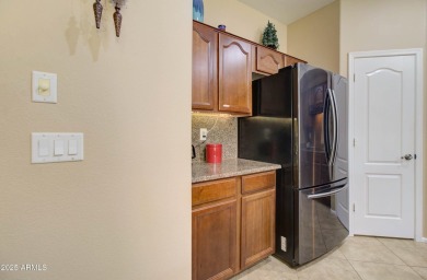 This gorgeous 4 bedroom, 3 bath home with a pool in the growing on The Golf Club At Johnson Ranch in Arizona - for sale on GolfHomes.com, golf home, golf lot