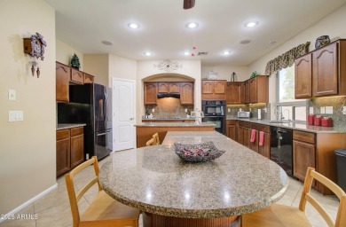This gorgeous 4 bedroom, 3 bath home with a pool in the growing on The Golf Club At Johnson Ranch in Arizona - for sale on GolfHomes.com, golf home, golf lot
