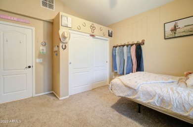 This gorgeous 4 bedroom, 3 bath home with a pool in the growing on The Golf Club At Johnson Ranch in Arizona - for sale on GolfHomes.com, golf home, golf lot