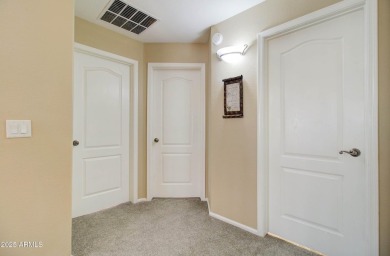This gorgeous 4 bedroom, 3 bath home with a pool in the growing on The Golf Club At Johnson Ranch in Arizona - for sale on GolfHomes.com, golf home, golf lot