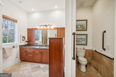 Welcome to 1259 Birch River Drive, a unique masterpiece nestled on Achasta Golf Club in Georgia - for sale on GolfHomes.com, golf home, golf lot