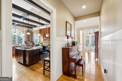 Welcome to 1259 Birch River Drive, a unique masterpiece nestled on Achasta Golf Club in Georgia - for sale on GolfHomes.com, golf home, golf lot