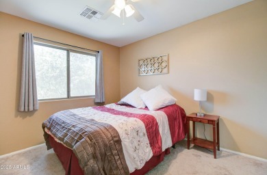 This gorgeous 4 bedroom, 3 bath home with a pool in the growing on The Golf Club At Johnson Ranch in Arizona - for sale on GolfHomes.com, golf home, golf lot