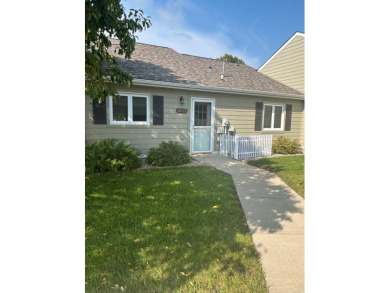 This beautiful townhouse features an open concept with a modern on Ortonville Muni Golf Course in Minnesota - for sale on GolfHomes.com, golf home, golf lot