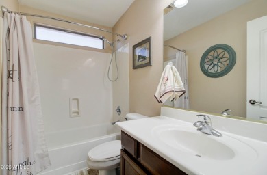 This gorgeous 4 bedroom, 3 bath home with a pool in the growing on The Golf Club At Johnson Ranch in Arizona - for sale on GolfHomes.com, golf home, golf lot