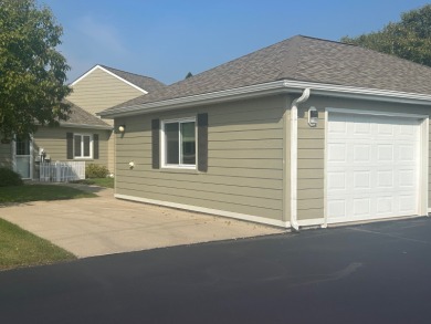 This beautiful townhouse features an open concept with a modern on Ortonville Muni Golf Course in Minnesota - for sale on GolfHomes.com, golf home, golf lot
