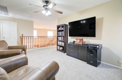 This gorgeous 4 bedroom, 3 bath home with a pool in the growing on The Golf Club At Johnson Ranch in Arizona - for sale on GolfHomes.com, golf home, golf lot