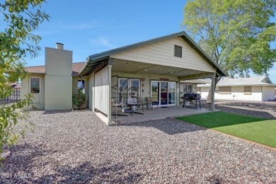 The Brick Driveway Welcomes You To An Enclosed Courtyard on Sun City Lakes West and East in Arizona - for sale on GolfHomes.com, golf home, golf lot