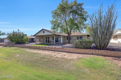 The Brick Driveway Welcomes You To An Enclosed Courtyard on Sun City Lakes West and East in Arizona - for sale on GolfHomes.com, golf home, golf lot