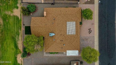 The Brick Driveway Welcomes You To An Enclosed Courtyard on Sun City Lakes West and East in Arizona - for sale on GolfHomes.com, golf home, golf lot