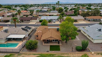 The Brick Driveway Welcomes You To An Enclosed Courtyard on Sun City Lakes West and East in Arizona - for sale on GolfHomes.com, golf home, golf lot
