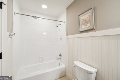 Welcome to 1259 Birch River Drive, a unique masterpiece nestled on Achasta Golf Club in Georgia - for sale on GolfHomes.com, golf home, golf lot