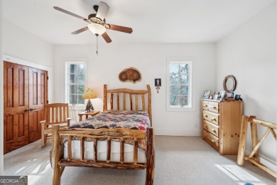 Welcome to 1259 Birch River Drive, a unique masterpiece nestled on Achasta Golf Club in Georgia - for sale on GolfHomes.com, golf home, golf lot