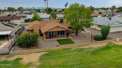 The Brick Driveway Welcomes You To An Enclosed Courtyard on Sun City Lakes West and East in Arizona - for sale on GolfHomes.com, golf home, golf lot