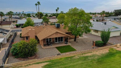 The Brick Driveway Welcomes You To An Enclosed Courtyard on Sun City Lakes West and East in Arizona - for sale on GolfHomes.com, golf home, golf lot
