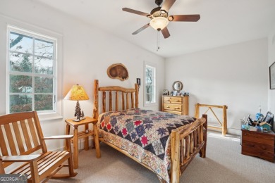 Welcome to 1259 Birch River Drive, a unique masterpiece nestled on Achasta Golf Club in Georgia - for sale on GolfHomes.com, golf home, golf lot