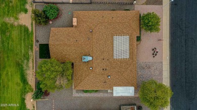 The Brick Driveway Welcomes You To An Enclosed Courtyard on Sun City Lakes West and East in Arizona - for sale on GolfHomes.com, golf home, golf lot