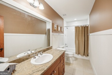 Welcome to 1259 Birch River Drive, a unique masterpiece nestled on Achasta Golf Club in Georgia - for sale on GolfHomes.com, golf home, golf lot