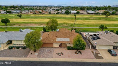 The Brick Driveway Welcomes You To An Enclosed Courtyard on Sun City Lakes West and East in Arizona - for sale on GolfHomes.com, golf home, golf lot