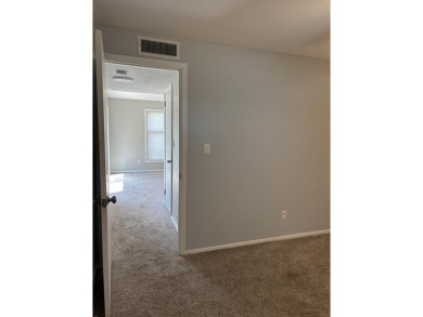 This large 2 bedroom (could be 3) 2 bath townhouse is in the on Cherokee Village North Course in Arkansas - for sale on GolfHomes.com, golf home, golf lot