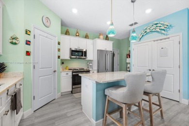 Welcome to your PERFECT Beach Bungalow Retreat! This STUNNING on Venetian Bay Golf Course in Florida - for sale on GolfHomes.com, golf home, golf lot
