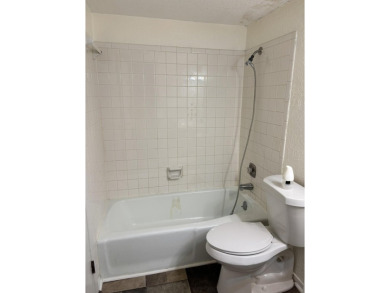 This large 2 bedroom (could be 3) 2 bath townhouse is in the on Cherokee Village North Course in Arkansas - for sale on GolfHomes.com, golf home, golf lot