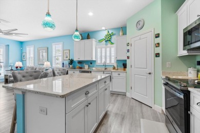 Welcome to your PERFECT Beach Bungalow Retreat! This STUNNING on Venetian Bay Golf Course in Florida - for sale on GolfHomes.com, golf home, golf lot