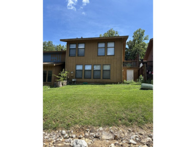 This large 2 bedroom (could be 3) 2 bath townhouse is in the on Cherokee Village North Course in Arkansas - for sale on GolfHomes.com, golf home, golf lot