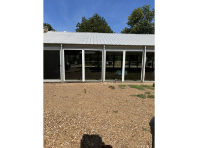 This large 2 bedroom (could be 3) 2 bath townhouse is in the on Cherokee Village North Course in Arkansas - for sale on GolfHomes.com, golf home, golf lot