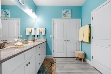 Welcome to your PERFECT Beach Bungalow Retreat! This STUNNING on Venetian Bay Golf Course in Florida - for sale on GolfHomes.com, golf home, golf lot
