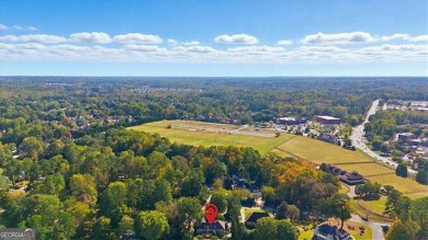 Welcome to 5935 Polo Drive - one of the most affordable homes in on Polo Golf and Country Club in Georgia - for sale on GolfHomes.com, golf home, golf lot