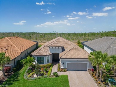 This highly upgraded Pallazio model overlooks a peaceful on Esplanade Golf and  Country Club in Florida - for sale on GolfHomes.com, golf home, golf lot