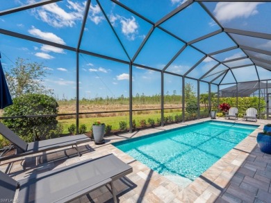 This highly upgraded Pallazio model overlooks a peaceful on Esplanade Golf and  Country Club in Florida - for sale on GolfHomes.com, golf home, golf lot