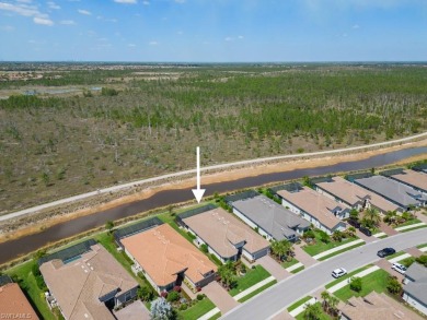 This highly upgraded Pallazio model overlooks a peaceful on Esplanade Golf and  Country Club in Florida - for sale on GolfHomes.com, golf home, golf lot