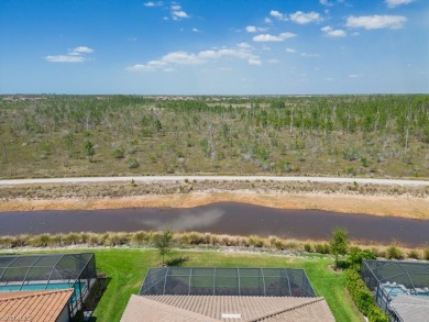 This highly upgraded Pallazio model overlooks a peaceful on Esplanade Golf and  Country Club in Florida - for sale on GolfHomes.com, golf home, golf lot