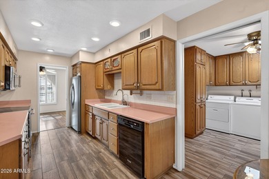 Location is everything and this charming home sits on a large on Sunland Village Golf Club in Arizona - for sale on GolfHomes.com, golf home, golf lot