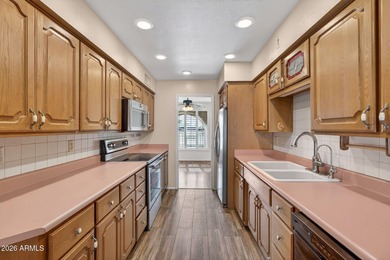 Location is everything and this charming home sits on a large on Sunland Village Golf Club in Arizona - for sale on GolfHomes.com, golf home, golf lot