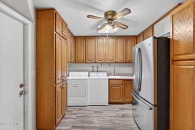 Location is everything and this charming home sits on a large on Sunland Village Golf Club in Arizona - for sale on GolfHomes.com, golf home, golf lot