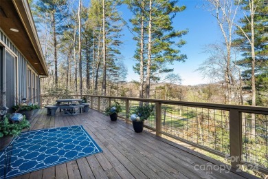 Perched above Hickory Hills Golf Course, this 3-bedroom, 4-bath on Grassy Creek Golf and Country Club in North Carolina - for sale on GolfHomes.com, golf home, golf lot