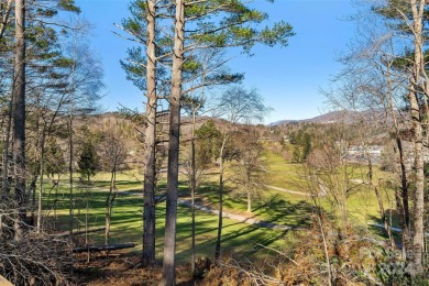 Perched above Hickory Hills Golf Course, this 3-bedroom, 4-bath on Grassy Creek Golf and Country Club in North Carolina - for sale on GolfHomes.com, golf home, golf lot