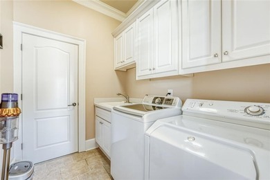 Immaculate 4 bedrooms/flex room, 3 1/2 baths, brick front home on Chateau Elan Golf Club  in Georgia - for sale on GolfHomes.com, golf home, golf lot