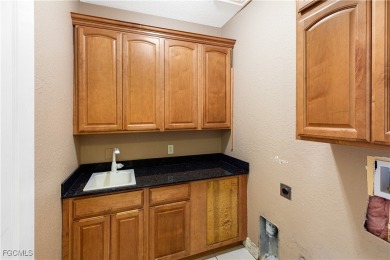 SPACIOUS 2-story Mediterranean-style home located in the on Royal Tee Country Club in Florida - for sale on GolfHomes.com, golf home, golf lot