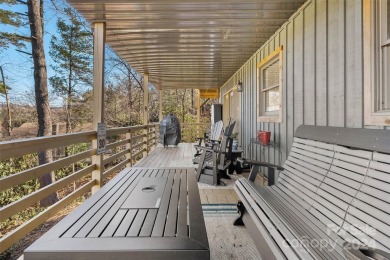 Perched above Hickory Hills Golf Course, this 3-bedroom, 4-bath on Grassy Creek Golf and Country Club in North Carolina - for sale on GolfHomes.com, golf home, golf lot