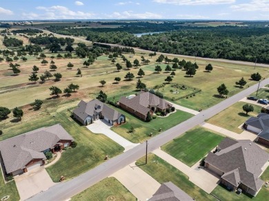 Gorgeous home located on the 15th hole of Cimarron National Golf on Cimarron National Golf Club in Oklahoma - for sale on GolfHomes.com, golf home, golf lot