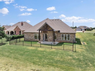 Gorgeous home located on the 15th hole of Cimarron National Golf on Cimarron National Golf Club in Oklahoma - for sale on GolfHomes.com, golf home, golf lot