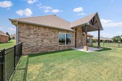 Gorgeous home located on the 15th hole of Cimarron National Golf on Cimarron National Golf Club in Oklahoma - for sale on GolfHomes.com, golf home, golf lot
