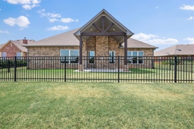 Gorgeous home located on the 15th hole of Cimarron National Golf on Cimarron National Golf Club in Oklahoma - for sale on GolfHomes.com, golf home, golf lot